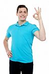 Smiling Guy With An Excellent Gesture Stock Photo