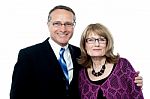 Smiling Happy Senior Couple Posing Stock Photo