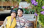 Smiling Happy Seniors Couple In Garden Stock Photo