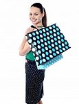 Smiling Lady Holding Shopping Bag Stock Photo