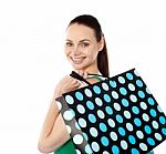 Smiling Lady Holding Shopping Bag Stock Photo