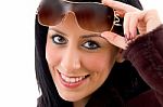 Smiling Lady Holding Sunglasses Stock Photo