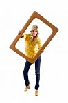 Smiling Lady Posing With Frame Stock Photo