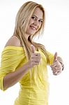 Smiling Lady Showing Good Luck Sign Stock Photo