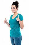 Smiling Lady Showing Thumbs Up Stock Photo