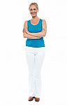 Smiling Lady With Arms Crossed Stock Photo