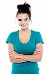 Smiling Lady With Arms Crossed Stock Photo