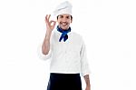 Smiling Male Chef Showing Ok Hand Sign Stock Photo