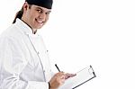 Smiling Male Chef With Clipboard Stock Photo