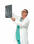 Smiling Male Doctor Holding X Ray Stock Photo