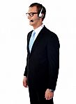 Smiling Male Executive Standing Stock Photo