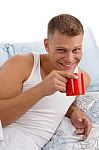 Smiling Male Having Coffee Mug Stock Photo