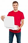 Smiling Male Holding Pizza Box Stock Photo