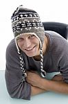 Smiling Male Wearing Woollen Cap Stock Photo