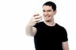 Smiling Man Clicking A Selfie Stock Photo