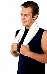 Smiling Man Holding Gym Towel Stock Photo