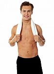 Smiling Man Holding Gym Towel Stock Photo