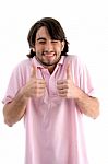 Smiling Man Showing Thumb Up Stock Photo