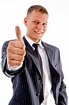 Smiling Manager Showing Thumb Up Stock Photo