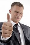 Smiling Manager Showing Thumb Up Stock Photo