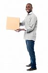 Smiling Middle Aged Delivery Man Stock Photo