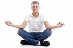 Smiling Model In Yoga Posture Stock Photo