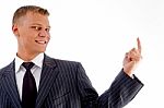 Smiling Pointing Businessman Stock Photo