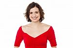 Smiling Pretty Woman In Fashionable Red Top Stock Photo