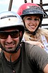 Smiling Riders Wearing Helmet Stock Photo