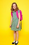 Smiling School Girl Carrying Bag Stock Photo