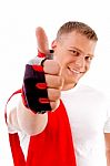 Smiling Spotive Male With Thumbs Up Stock Photo