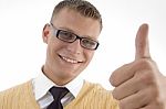 Smiling Student Showing Thumb Up Stock Photo