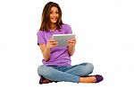 Smiling Teenage Girl Using Ipad Stock Photo