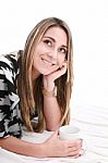 Smiling Woman Drinking Coffee Stock Photo