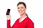 Smiling Woman Showing A Smart Phone Stock Photo