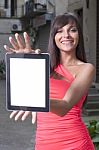 Smiling Woman Using Digital Tablet Stock Photo