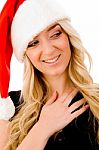 Smiling Woman Wearing Christmas Hat Stock Photo