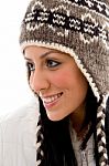 Smiling Woman Wearing Woolen Cap Stock Photo