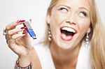 Smiling Woman With Usb Memory In Hands Stock Photo