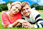 Smiling Young Couple In Outdoor Stock Photo