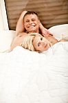 Smiling Young Couple Relaxing Stock Photo