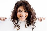 Smiling Young Girl Holding Card Stock Photo