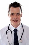 Smiling Young Male Doctor Stock Photo