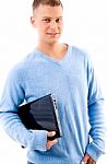 Smiling Young Man Holding Laptop Stock Photo