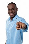 Smiling Young Man Pointing You Out Stock Photo