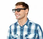 Smiling Young Man Wearing Glasses Stock Photo