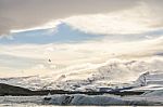 Snow Mountain Udder The Sky In Iceland Stock Photo