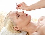 Spa Lady Having Eyebrows Plucked Stock Photo