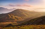 Spring Sunset In The Mountains. Seacoast And Hills Stock Photo