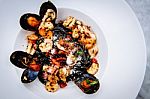  Squid Ink Pasta With King Prawns Stock Photo